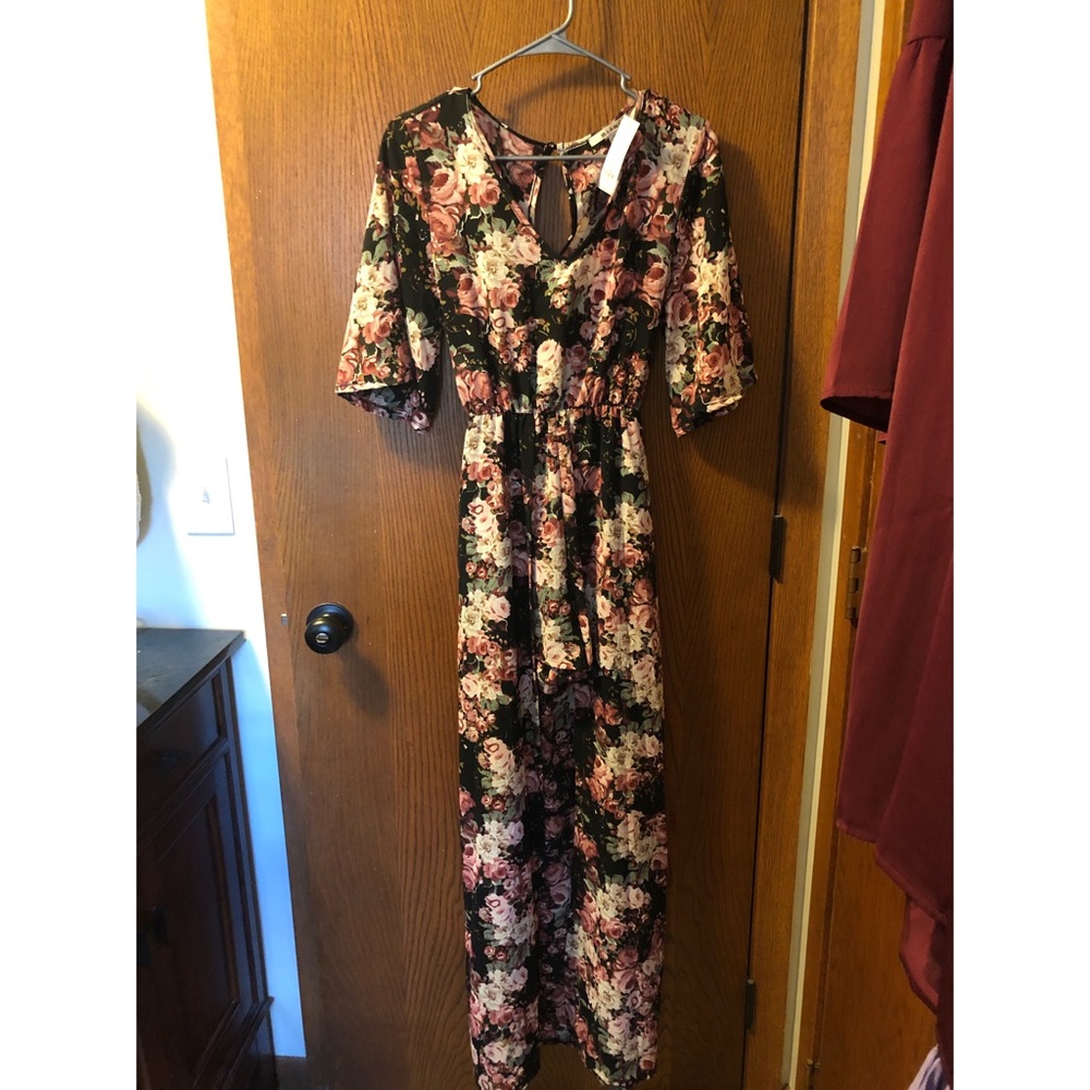 Floral romper dress. Never worn!
